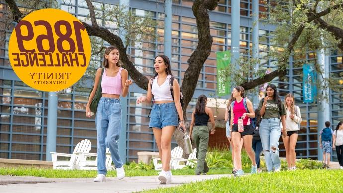 Webheader of students walking on campus past Northrup Hall