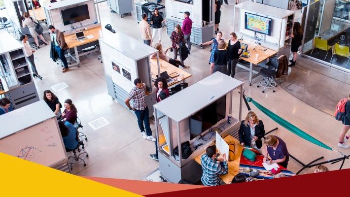 an overhead shot of the CSI cube shows multiple groups of students and faculty exhibiting research