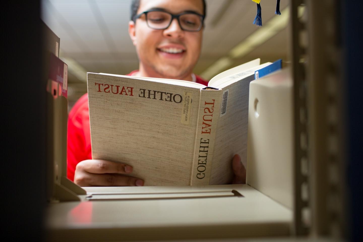 student reading Goethe's Faust