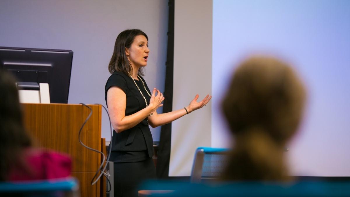 Professor at the podium in classroom