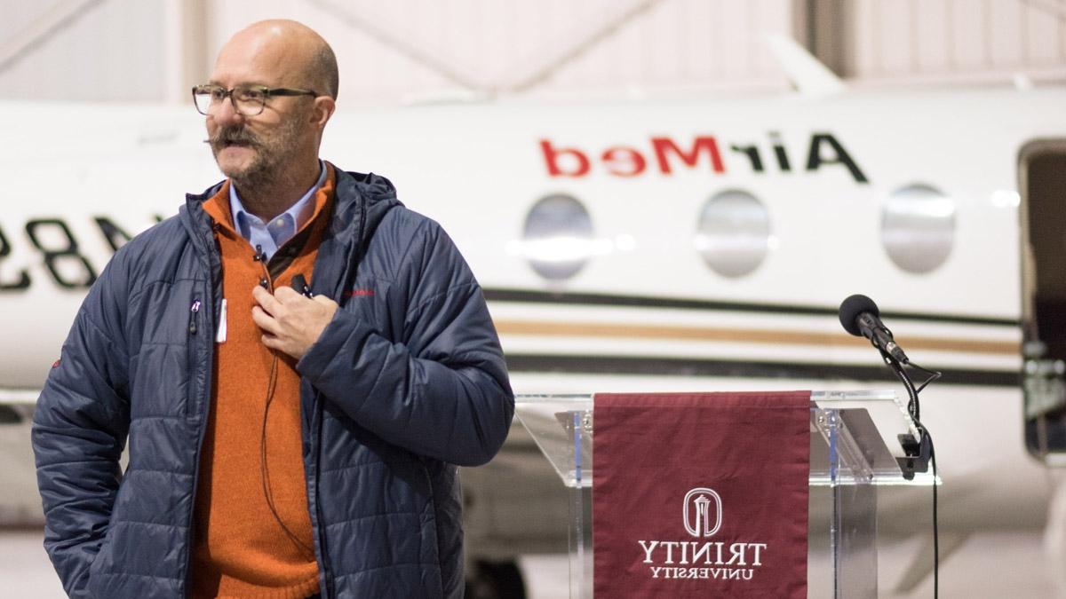 Les Bleamaster gives a lecture in front of an AirMed plane